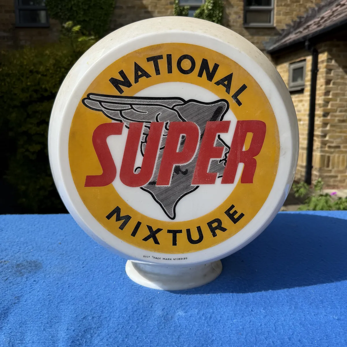 National Super Mixture petrol pump globe